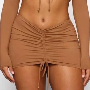 SKIMS Tan Mini Skirt